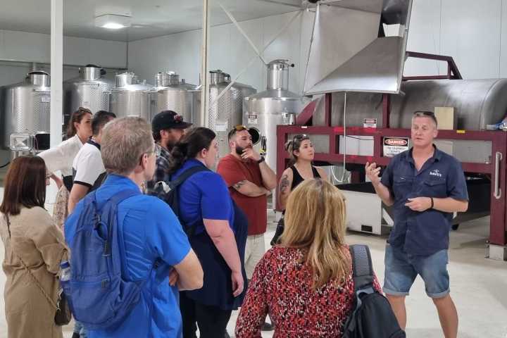 a group of people standing in a room
