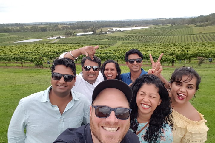 a group of people posing for the camera