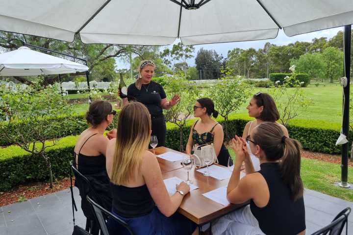 a group of people sitting at a table