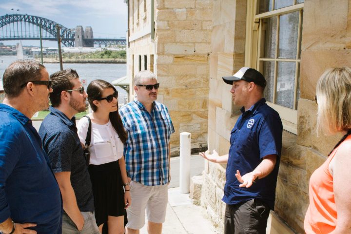 a group of people standing in front of a building