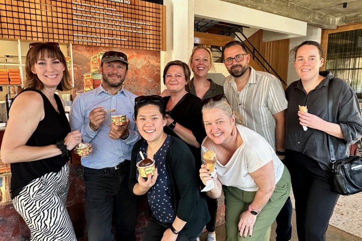 a group of people posing for the camera