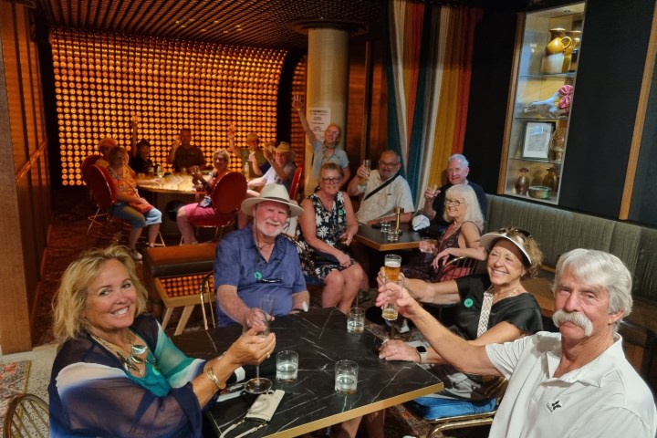 a group of people sitting posing for the camera
