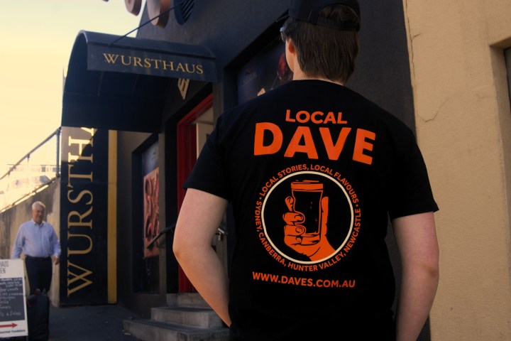 a person standing in front of a store