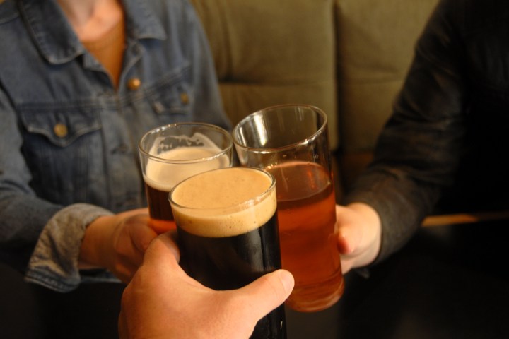 a person holding a cup of coffee