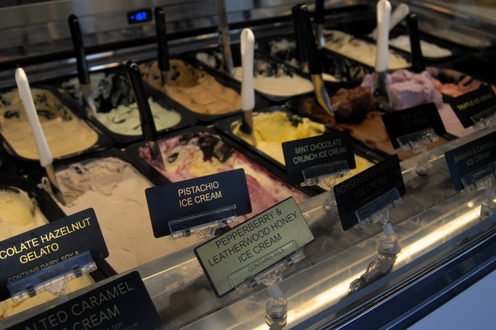 a stack of flyers on a table